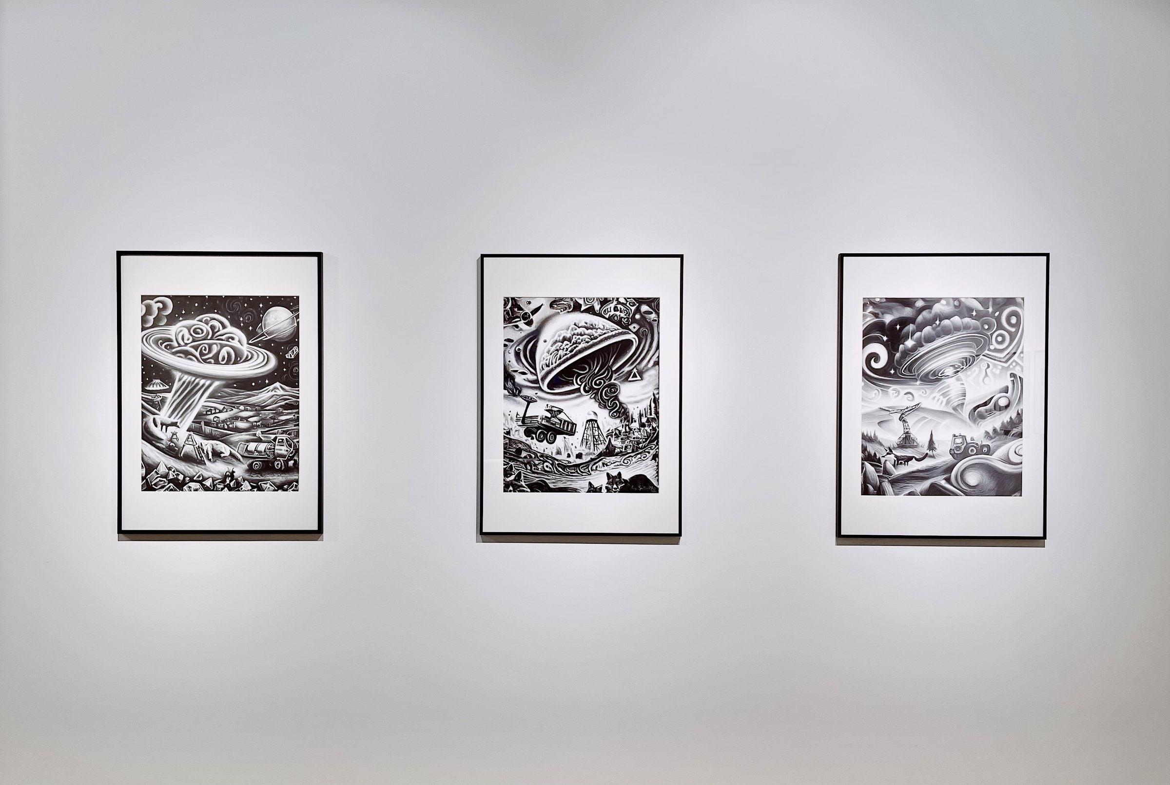 Three charcoal drawings