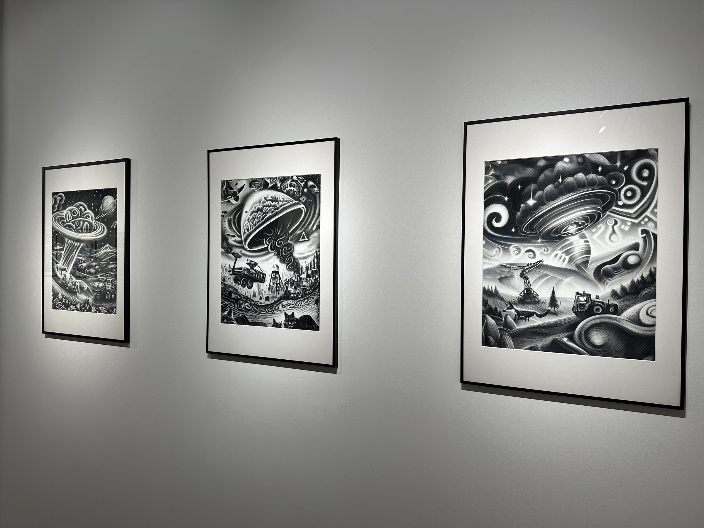 Charcoal drawings on the wall